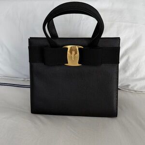 Salvatore Ferragamo Black Leather Top-Handle Bag with Gold Bow Hardware